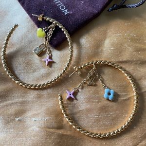 Louis Vuitton gold hoops with LV trinkets